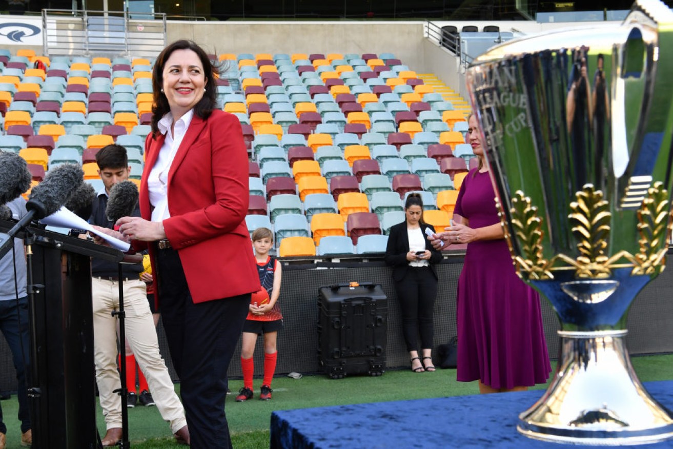 Queensland Premier Annastacia Palaszczuk celebrates the AFL grand final coming to the Gabba.  