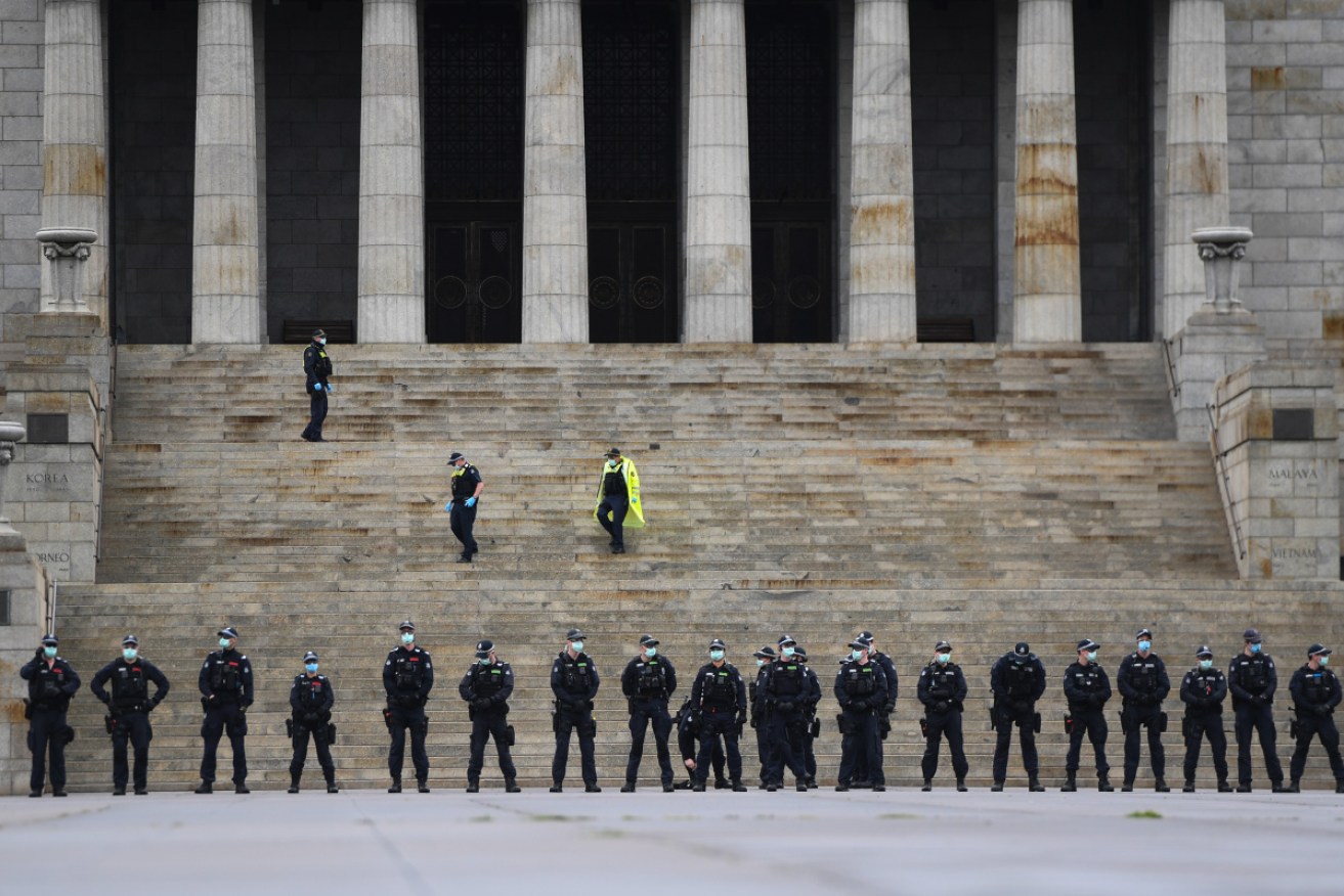 Police form a line around the Shrine of Remembrance in Melbourne.