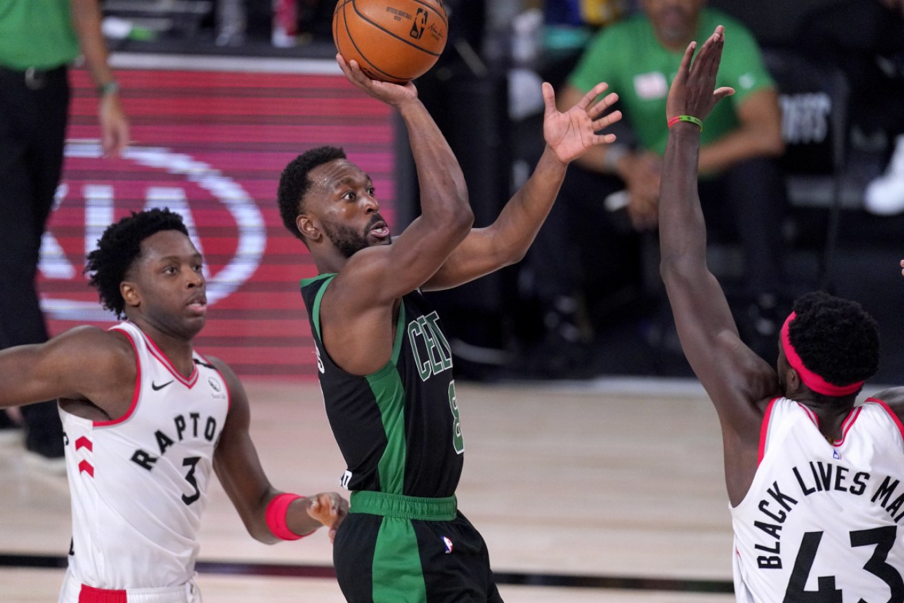 Boston Celtics' Kemba Walker shoots against Toronto Raptors.