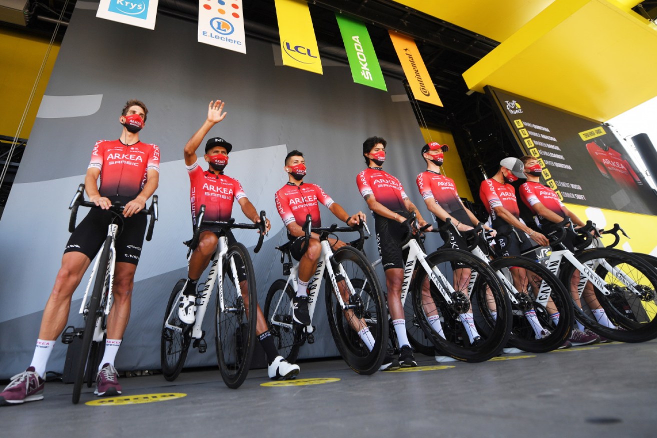 Colombian cyclist Nairo Quintana (2L) of Team Arkea-Samsic and teammates before the start of the 19th stage of the Tour de France.
