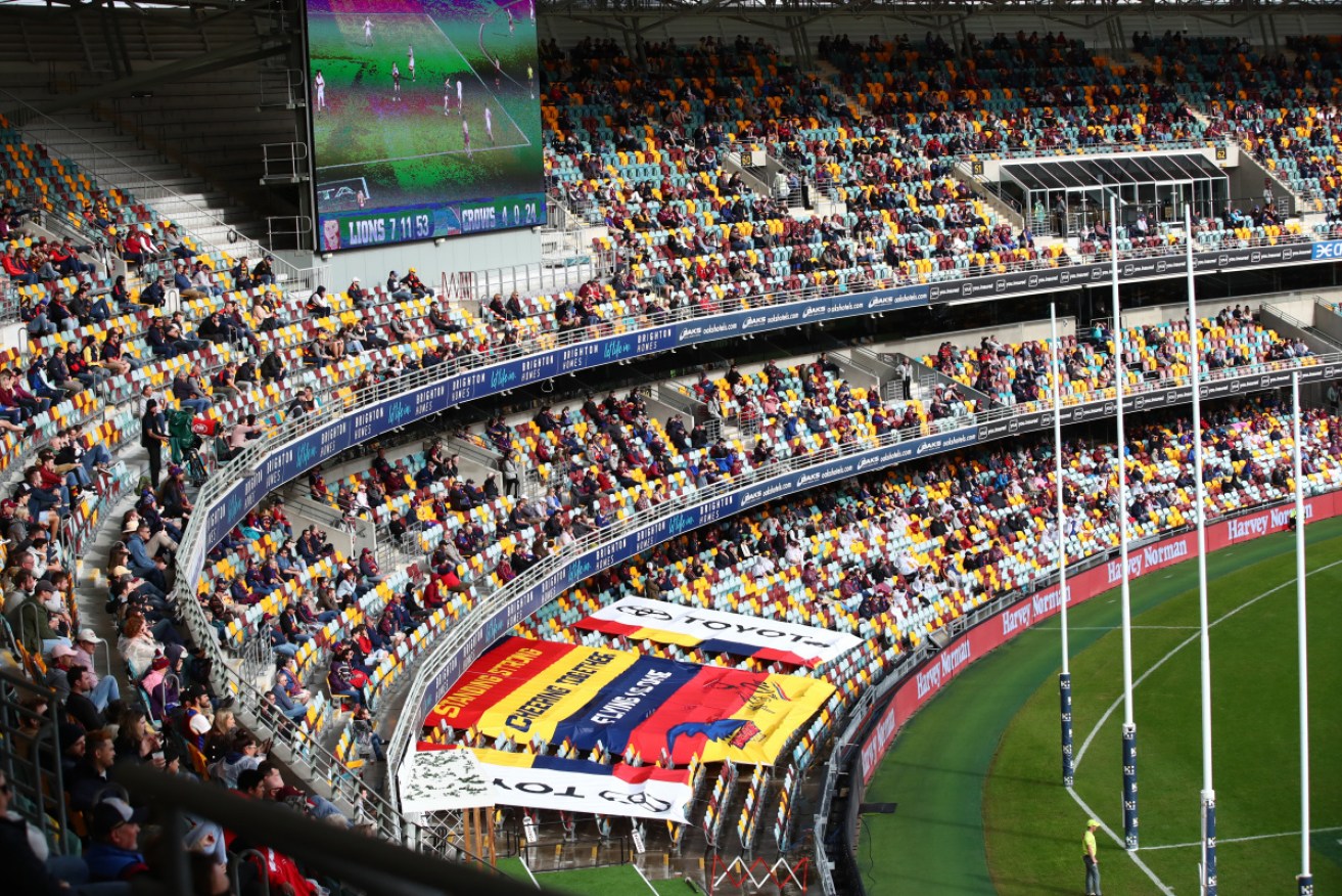 A small group of AFL fans at Monday's nights match will test a seating plan for the October grand final.