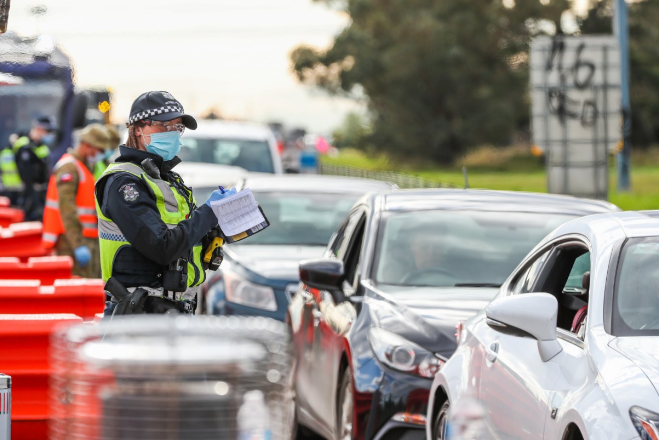 Drivers have their paperwork check at Little River, on Melbourne's south-western outskirts.