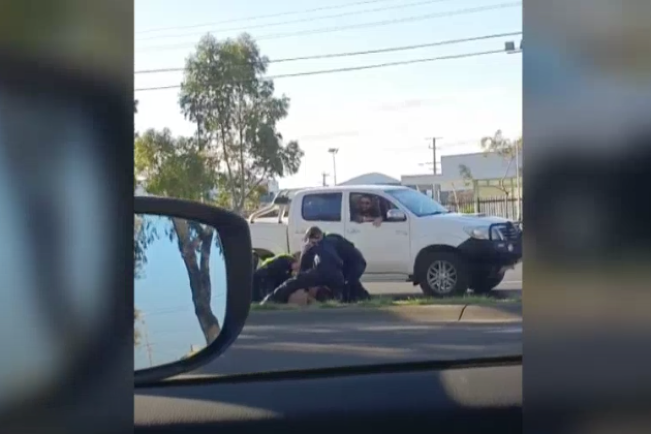 A passing motorist filmed the arrest on Sunday.