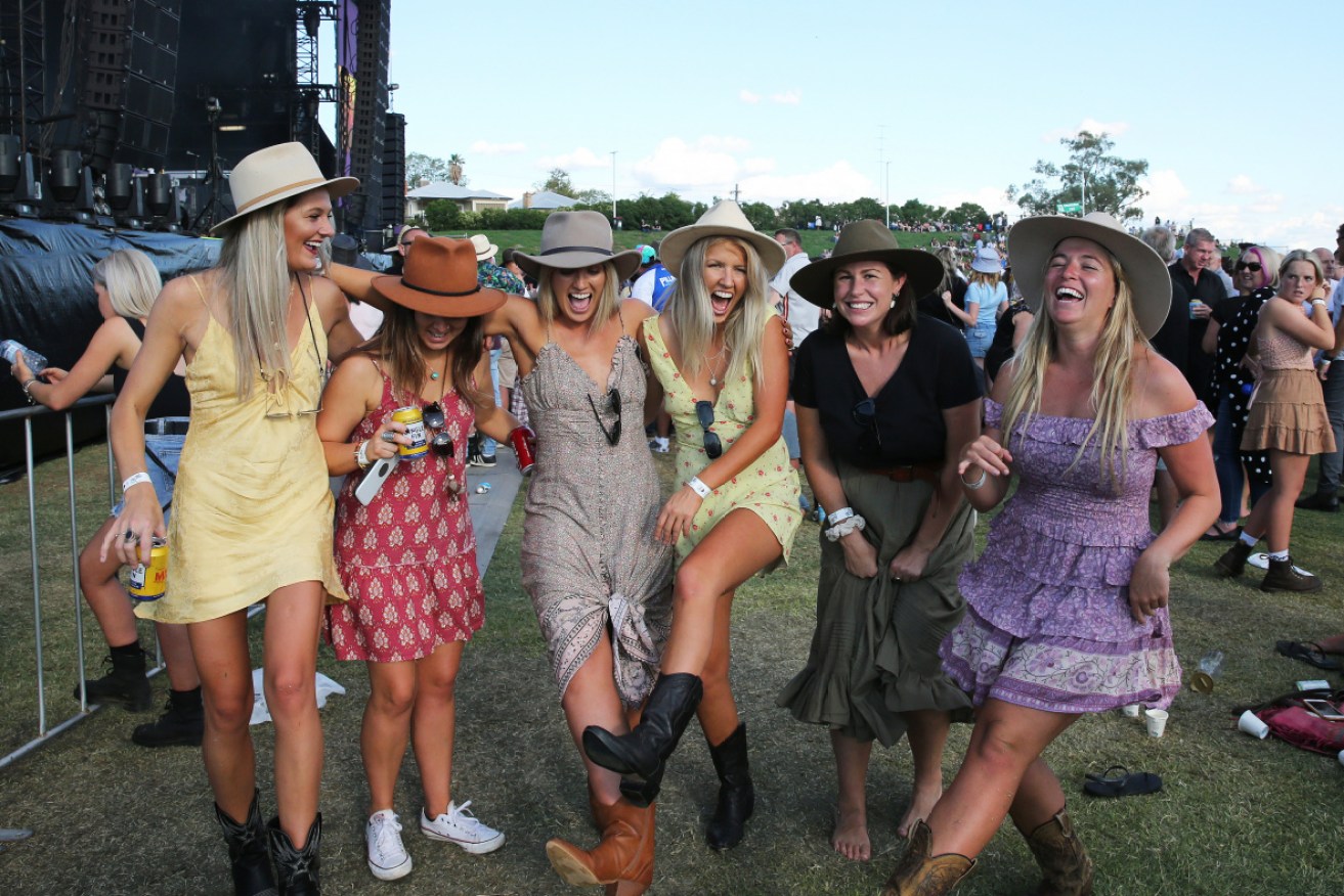 Attendees get in the spirit at the Tamworth Country Music Festival in January. 
