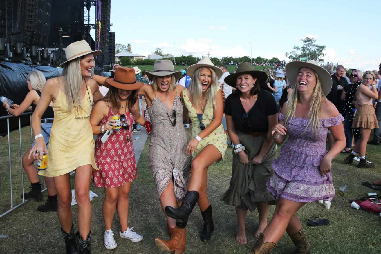 Attendees get in the spirit at the Tamworth Country Music Festival in January.