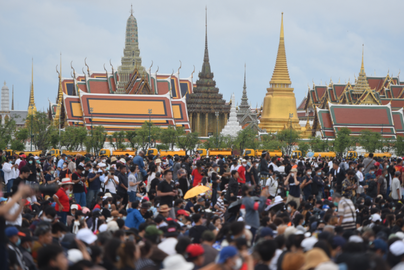 Tens of thousands of protesters join the call to limit the king's powers.