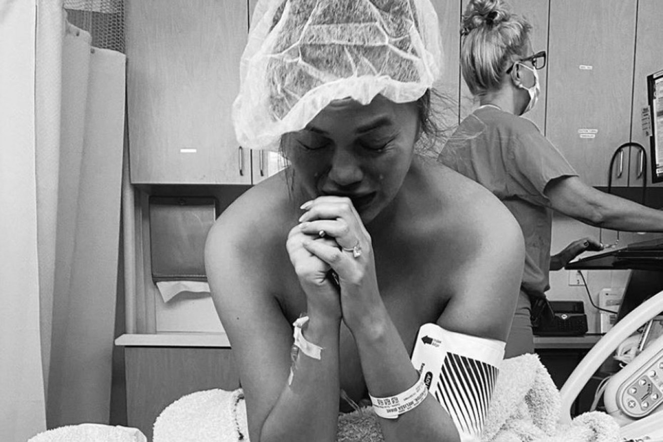 Chrissie Teigen in hospital, where she lost her third baby.