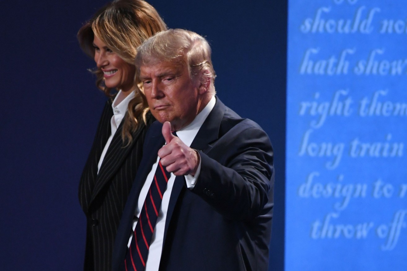 Donald and Melania Trump leave the presidential debate in Cleveland on Tuesday night.