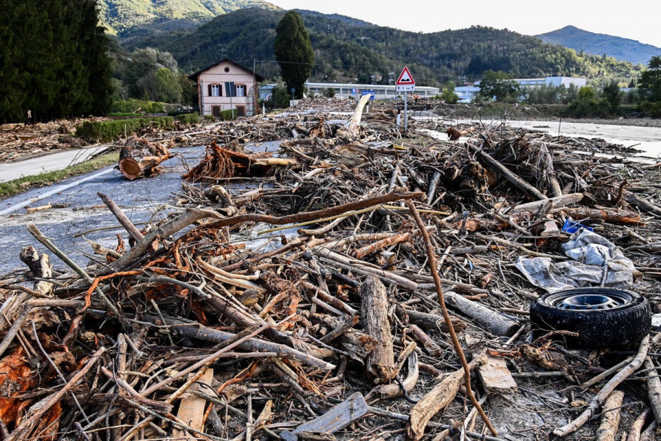 Driftwood washed up by the Tanaro river in Garessio, Piedmont, after Storm Alex caused landslides.