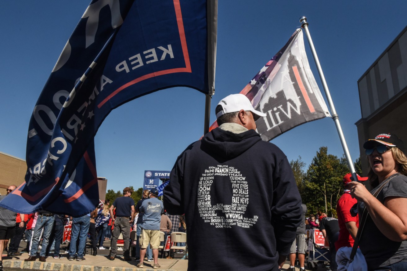 Instead of relying on user reports, Facebook staff now will seek out and delete any QAnon groups and pages, the company says.
