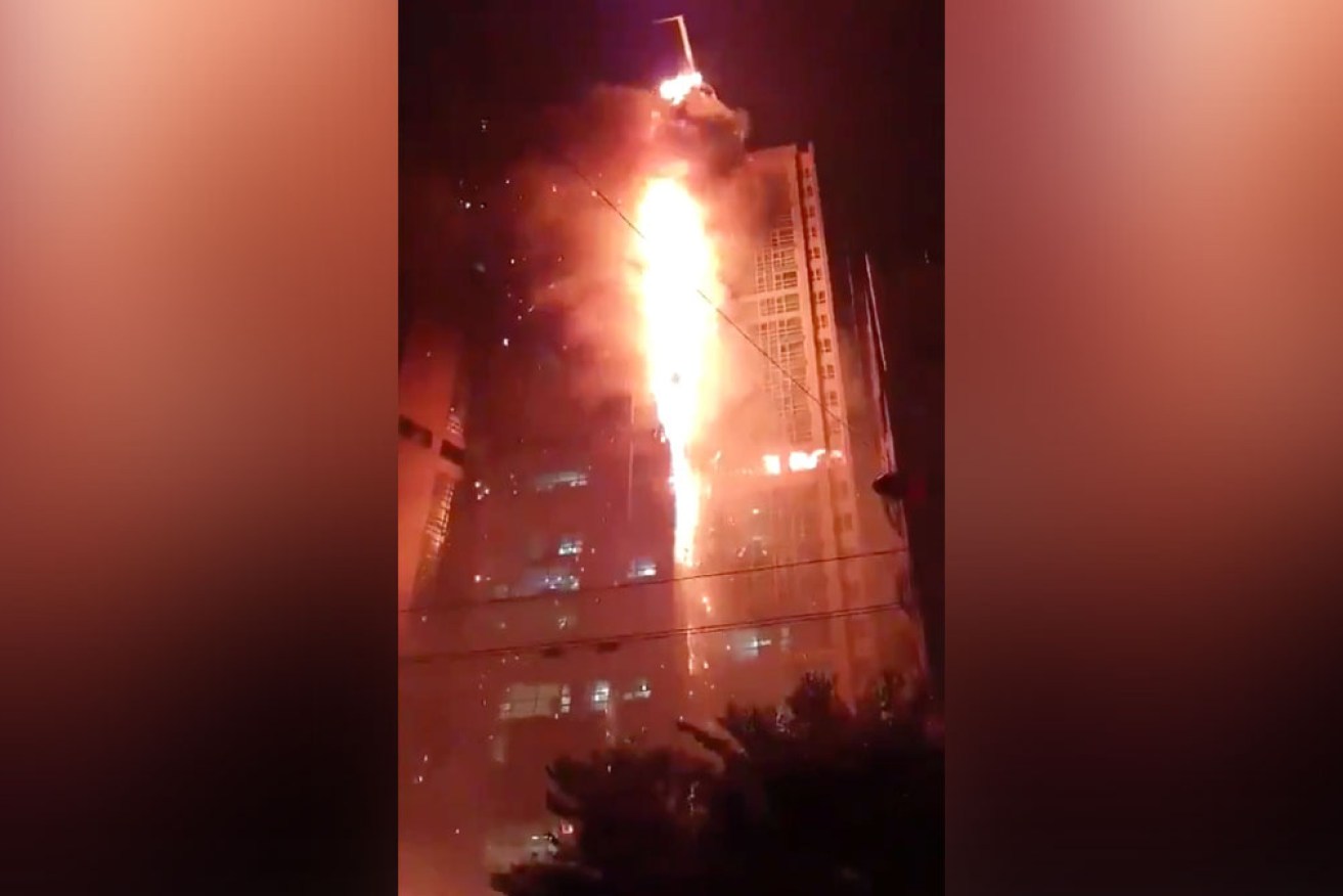 The fire broke out somewhere between the tower's eighth and 12th floors, and spread rapidly.