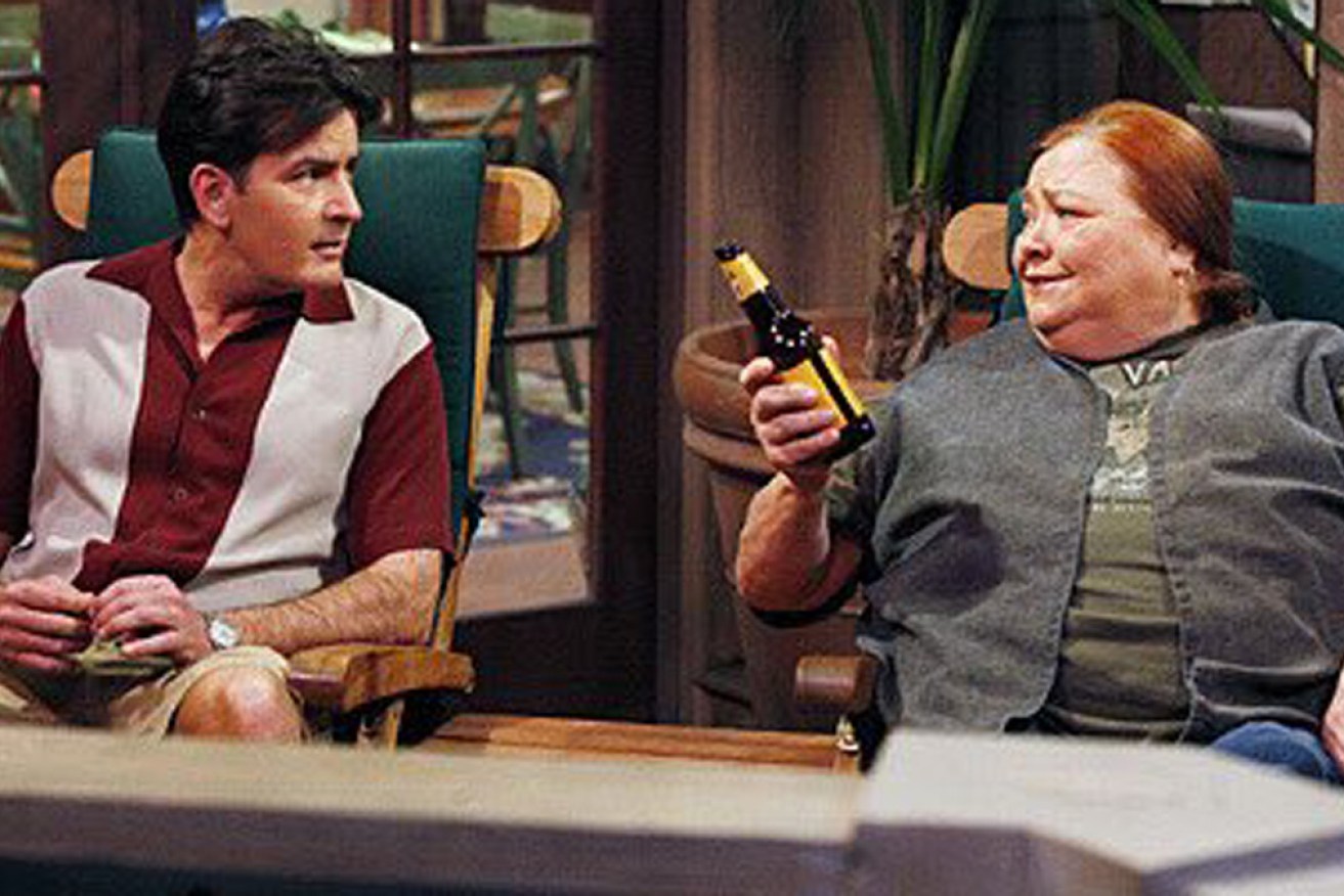 Conchata Ferrell and star Charlie Sheen in <i>Two and a Half Men</i>.