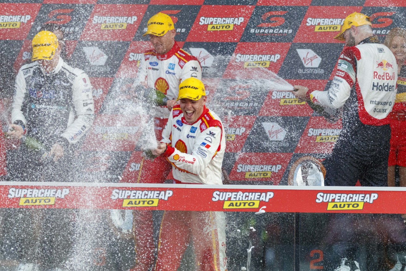 Scott McLaughlin on the podium after his Bathurst win in 2019. 
