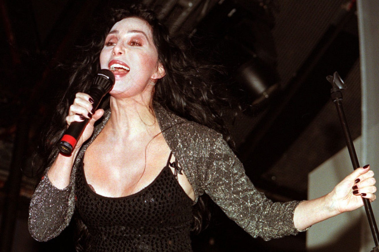 Pop icon Cher performs in London, 1998.