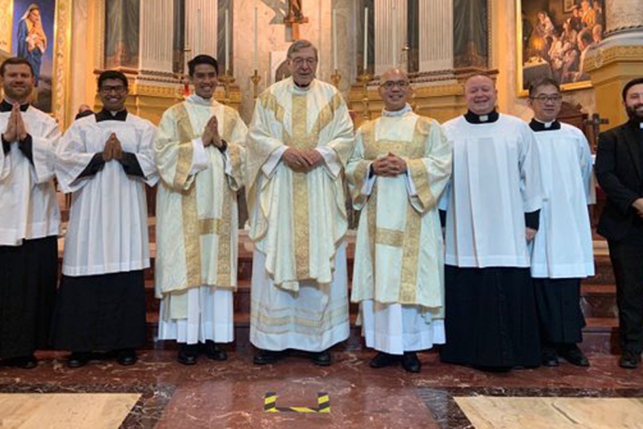 George Pell (centre) led Sunday's mass for St Mary MacKillop.