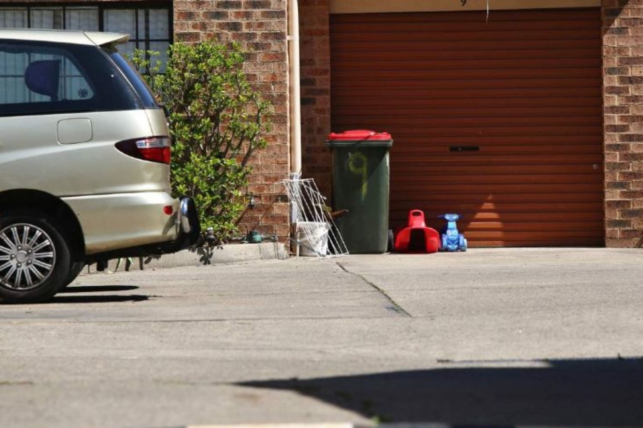 The toddler was struck by a neighbours' car on Tuesday night.