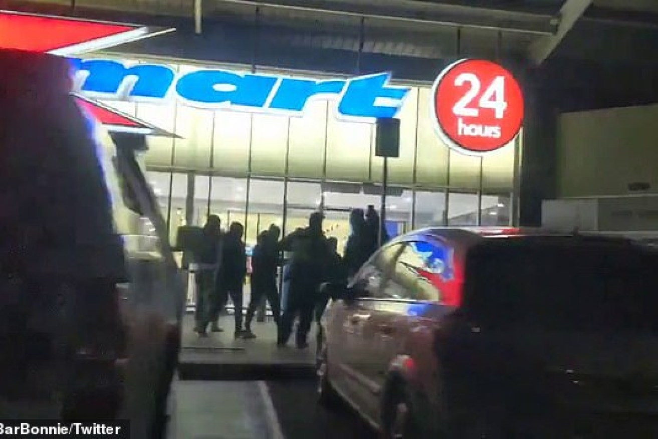 Deprived shoppers get their retail fix at a Kmart in Melbourne very early on Wednesday morning.
