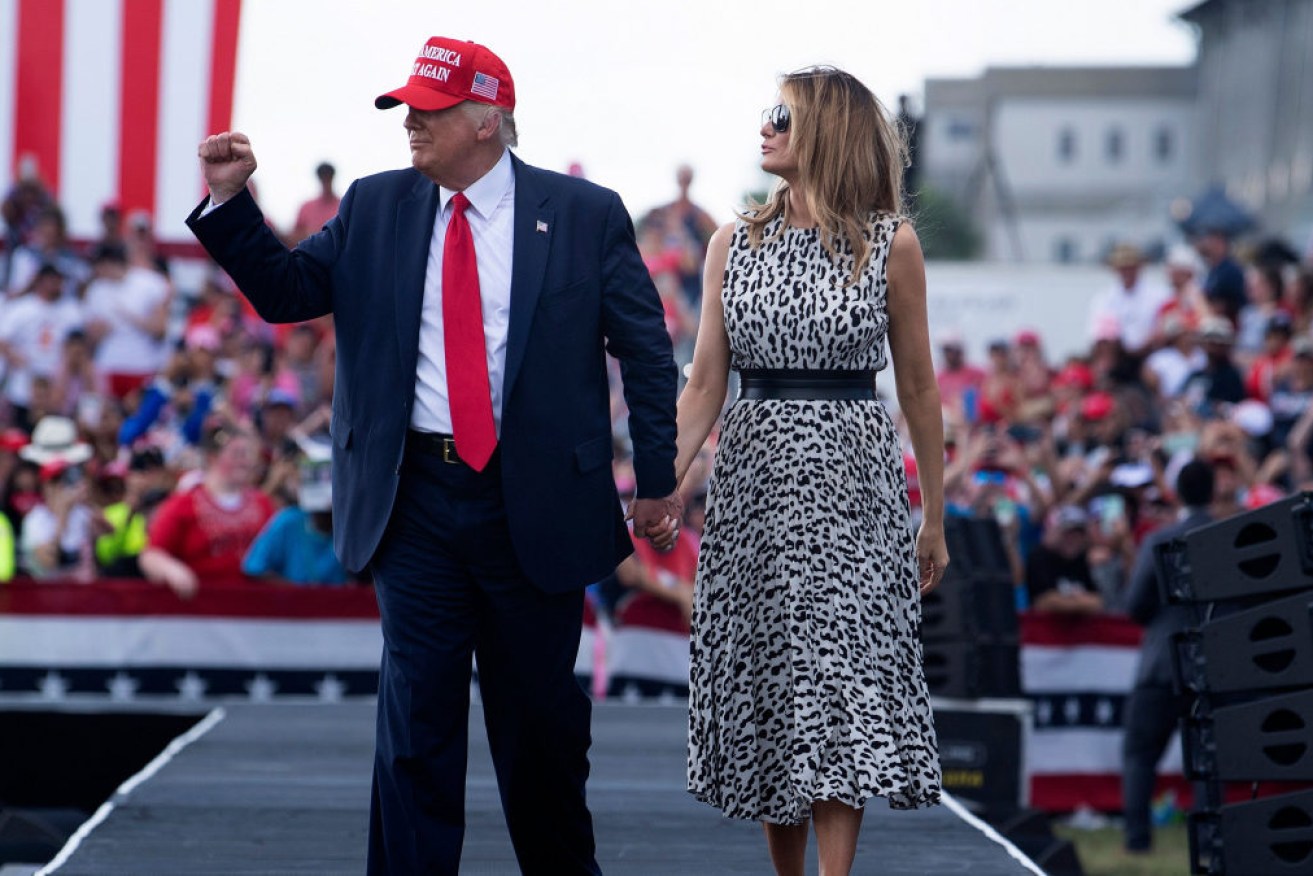 Donald and Melania Trump rouse supporters at a rally in Tampa, Florida.