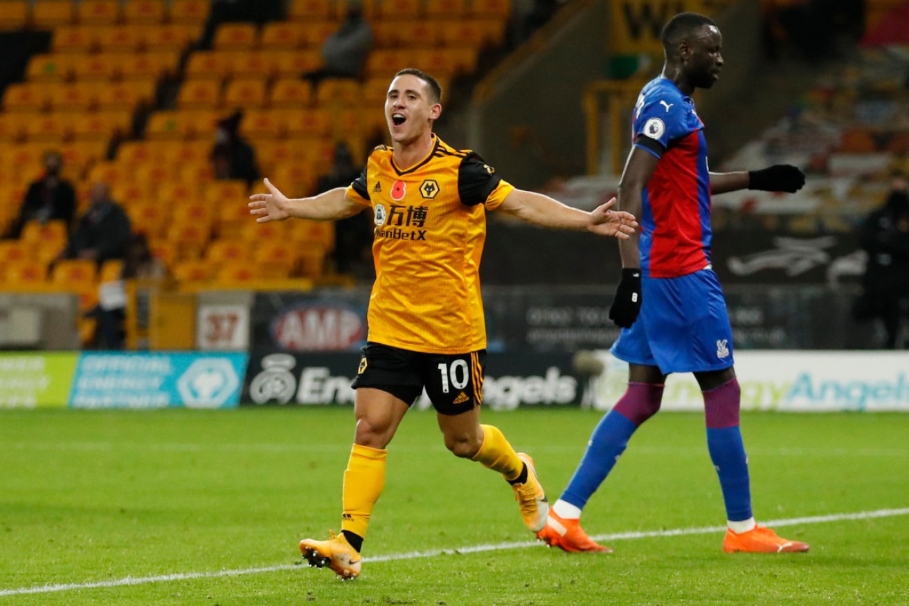 Wolves' Daniel Podence celebrates after scoring his team's second goal.