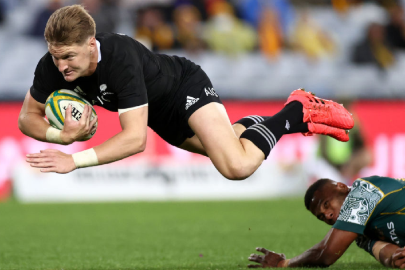 Beauden Barrett rubs Wallaby noses in the dirt, adding five more points to the All Blacks' runaway win.