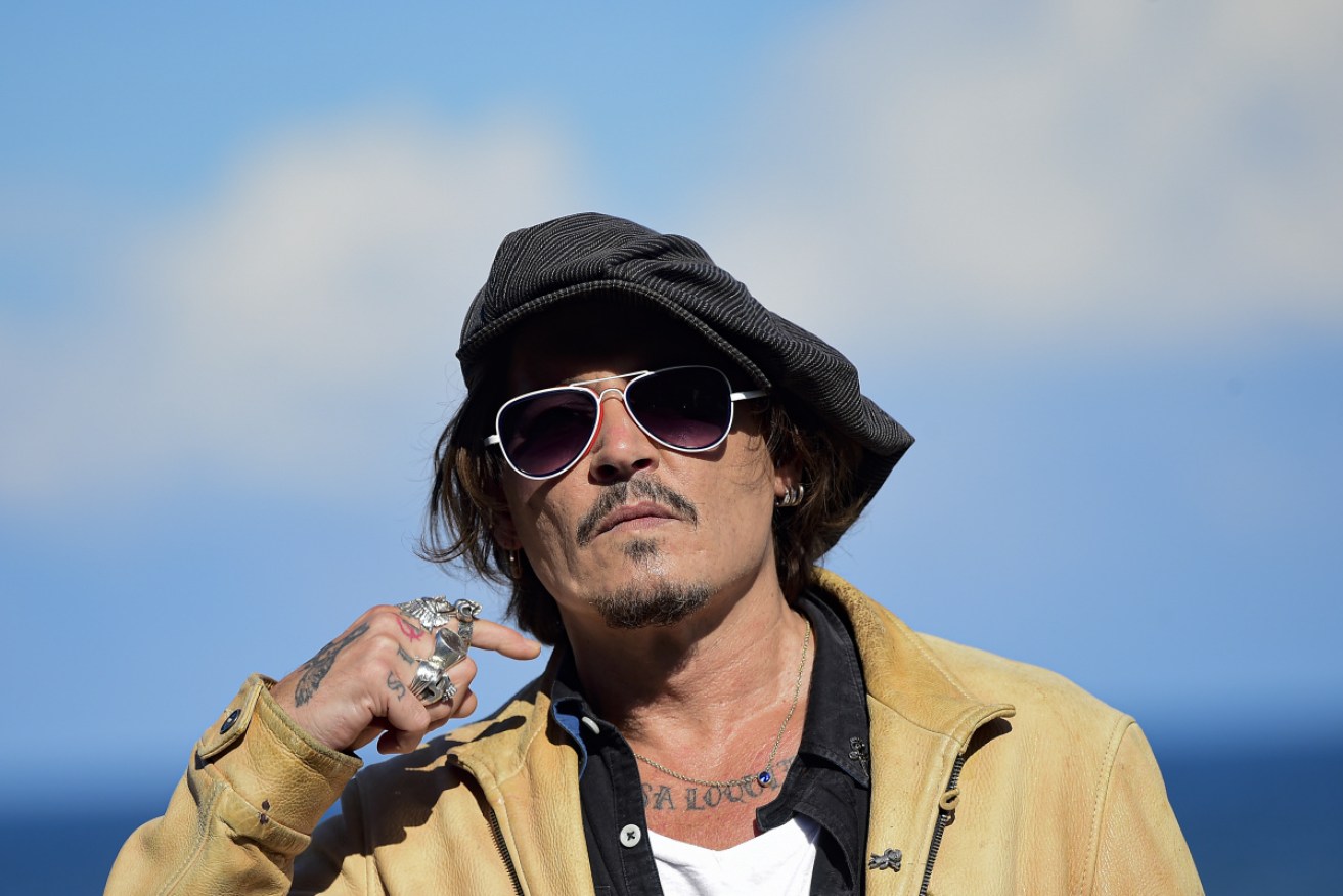 Johnny Depp, at the San Sebastian Film Festival in September, has lost his high-profile libel case. 