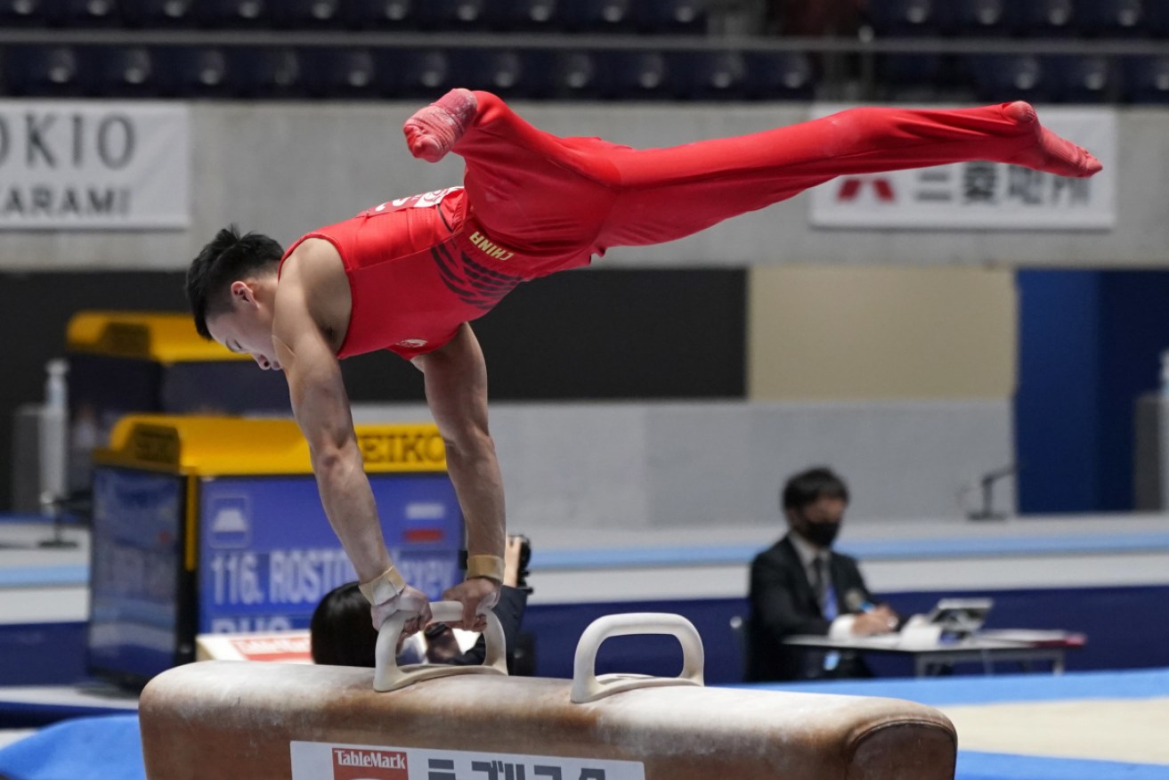 China’s Yin Dehang competes on the pommel horse at the Gymnastics Friendship and Solidarity Competition in Tokyo.