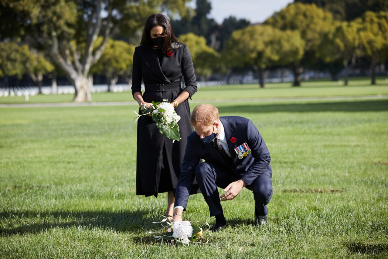 Prince Harry and wife Meghan Markle at the LA National Cemetery.