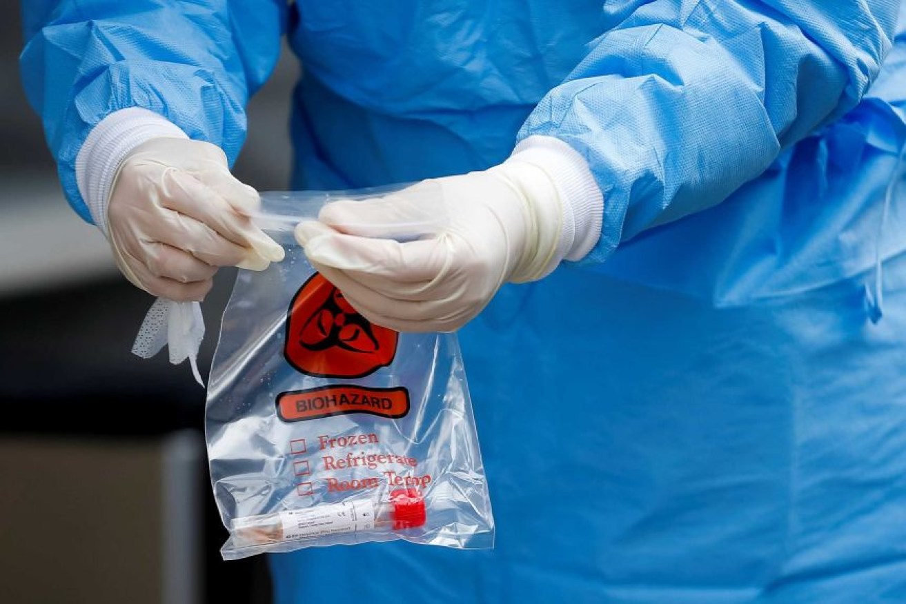 Victorian health authorities say testing is still an important part of the state's strategy to contain COVID-19.
Photo: ABC/Reuters/ Lindsey Wasson