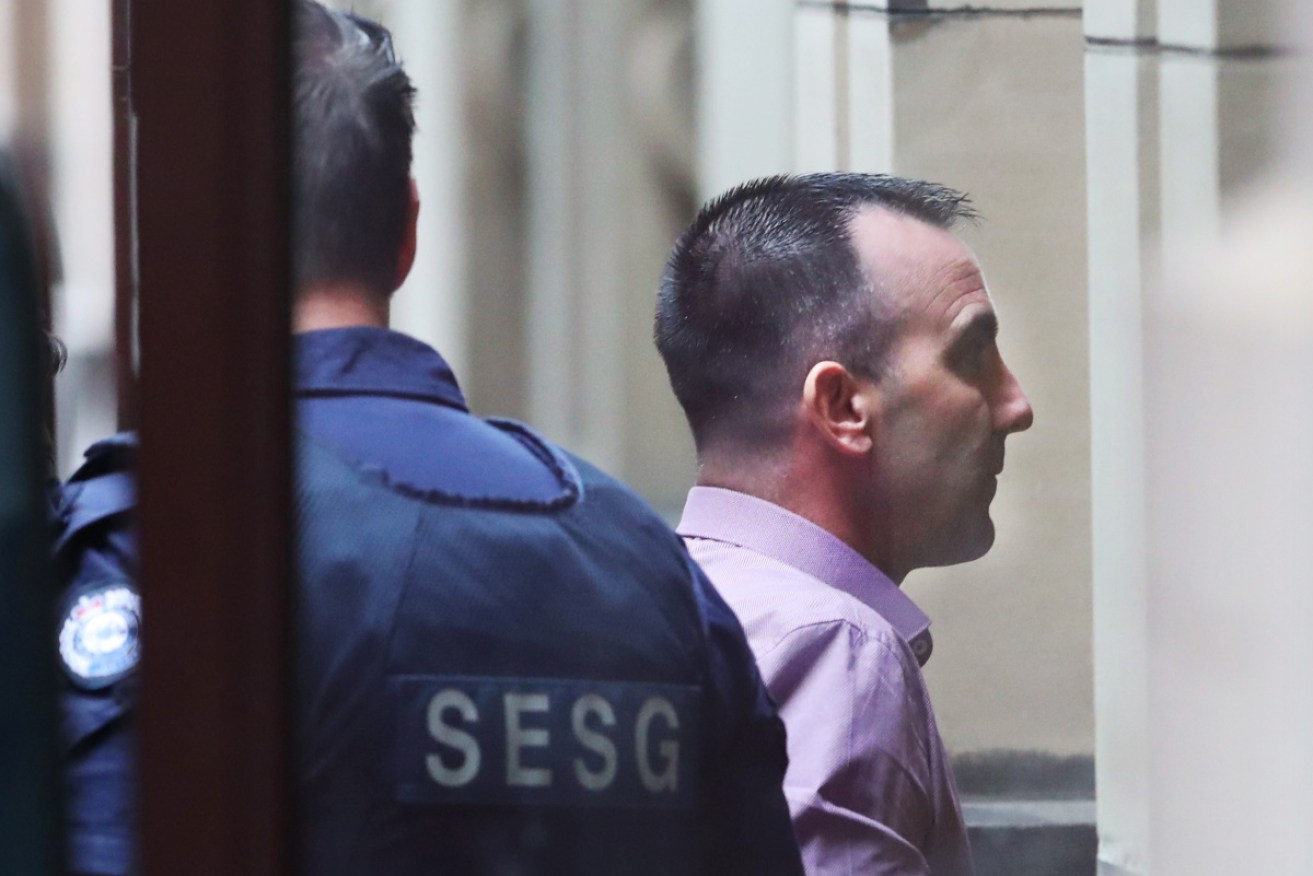 Jason Roberts has been found not guilty of the 1998 murders of two police officers.