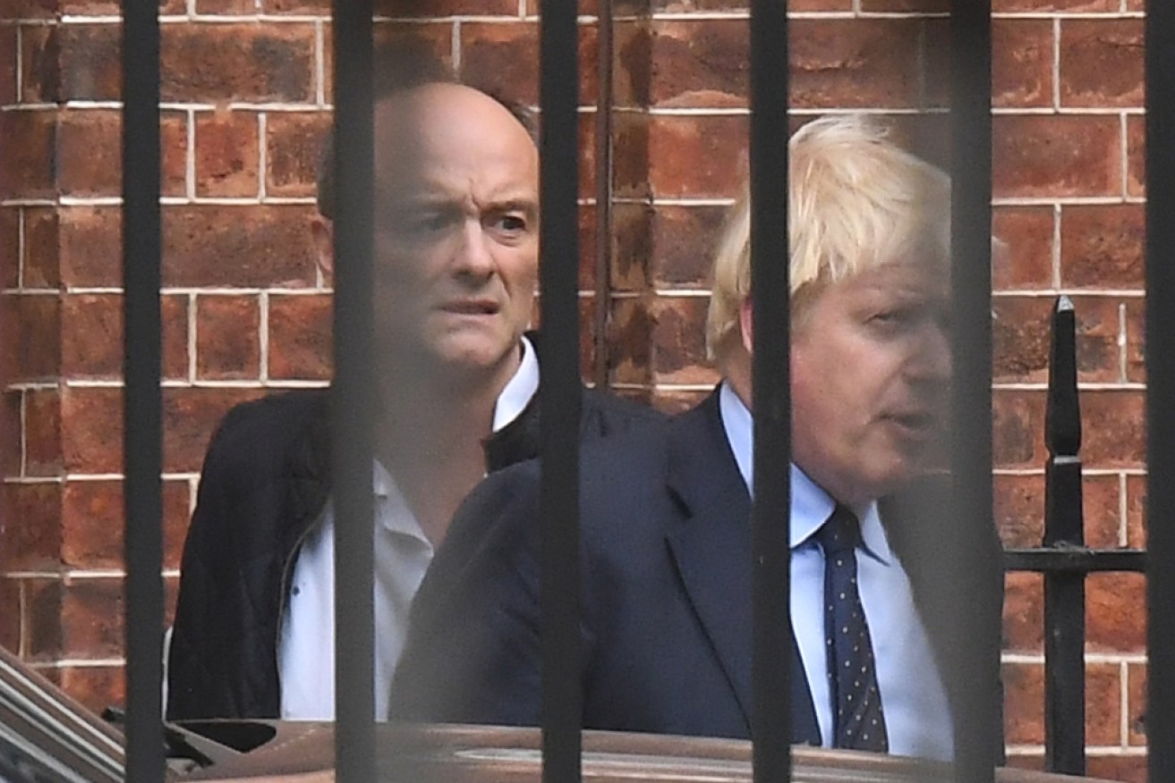 British PM Boris Johnson (right) with his senior aide Dominic Cummings. who left the PM's office in December.