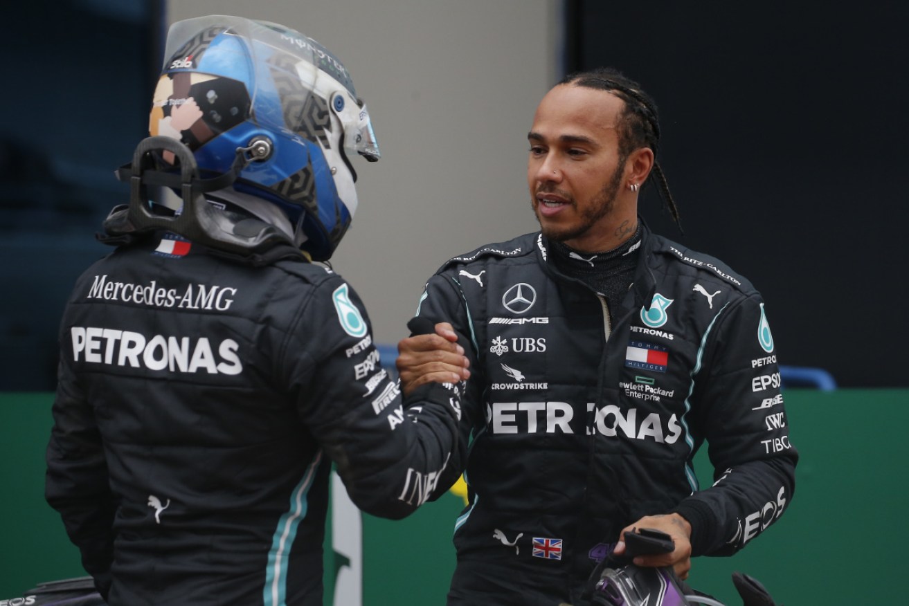 Valtteri Bottas congratulates his Mercedes teammate Lewis Hamilton after the Turkish Grand Prix on Sunday night. 