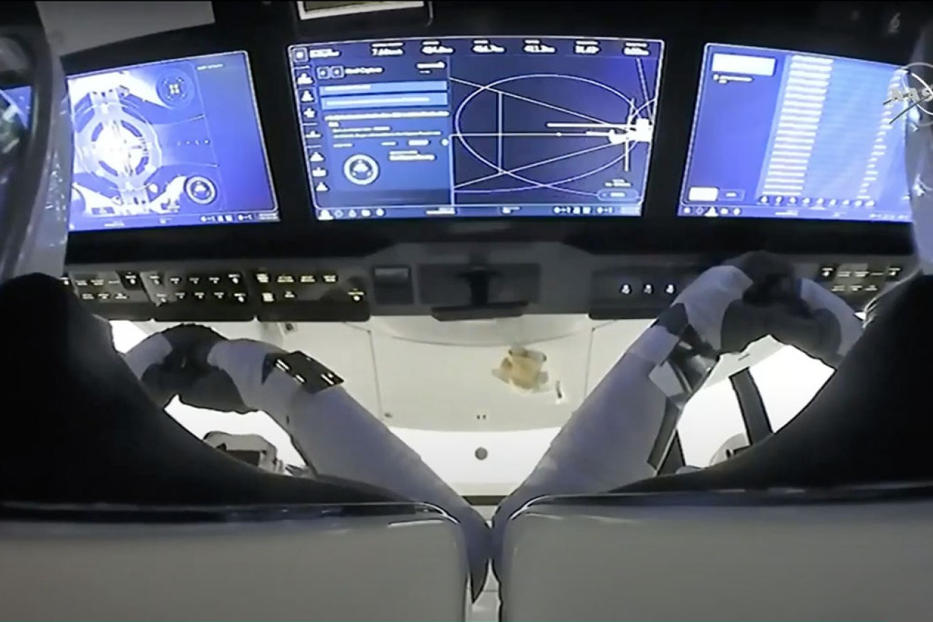 NASA cheered, and the space station crew eagerly awaited the four astronauts to get out of their suits and enter the ISS.