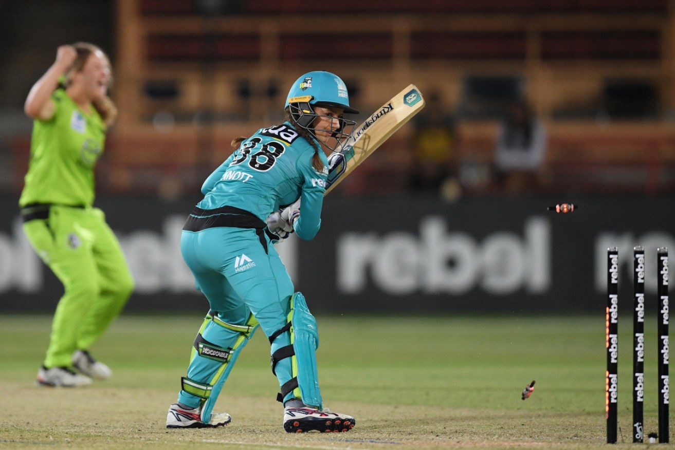 Thunder’s Hannah Darlington celebrates the wicket of Charli Knott at North Sydney Oval on Thursday night.