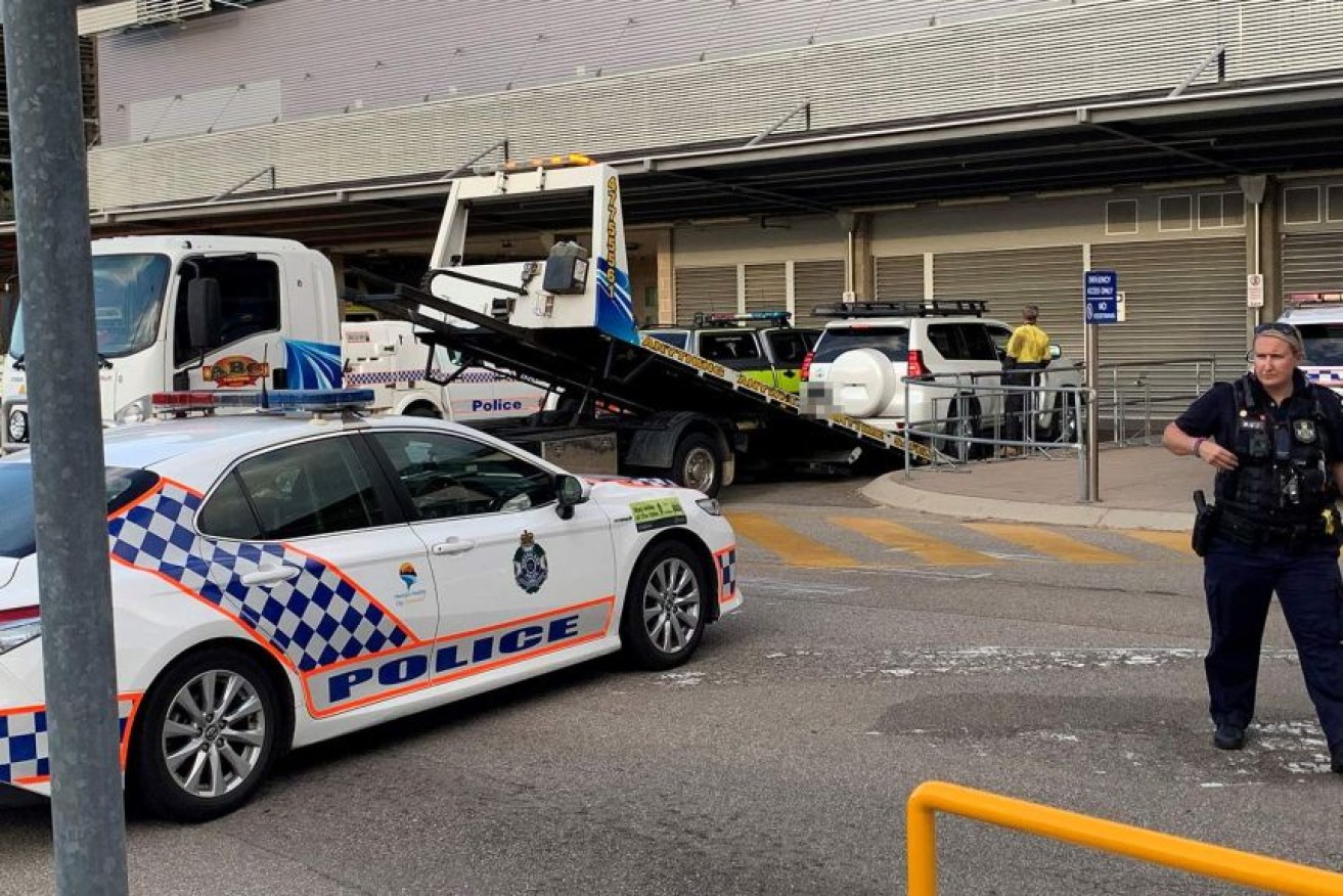 A white four-wheel drive was towed away from Townsville hospital as part of a police investigation on Friday.