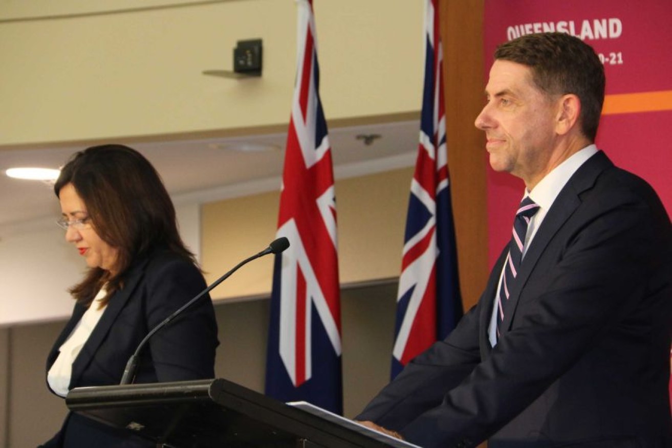 Queensland Premier Annastacia Palaszczuk and Treasurer Cameron Dick deliver the delayed budget.