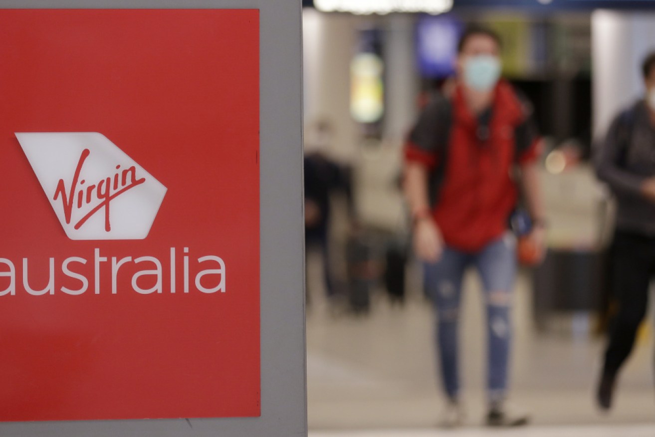 An entire Virgin Airways flight to Melbourne has been advised to self-isolate at home.