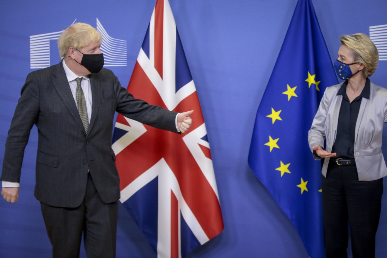 Boris Johnson (L) is welcomed by European Commission President Ursula von der Leyen (R) prior to post-Brexit trade deal talks.