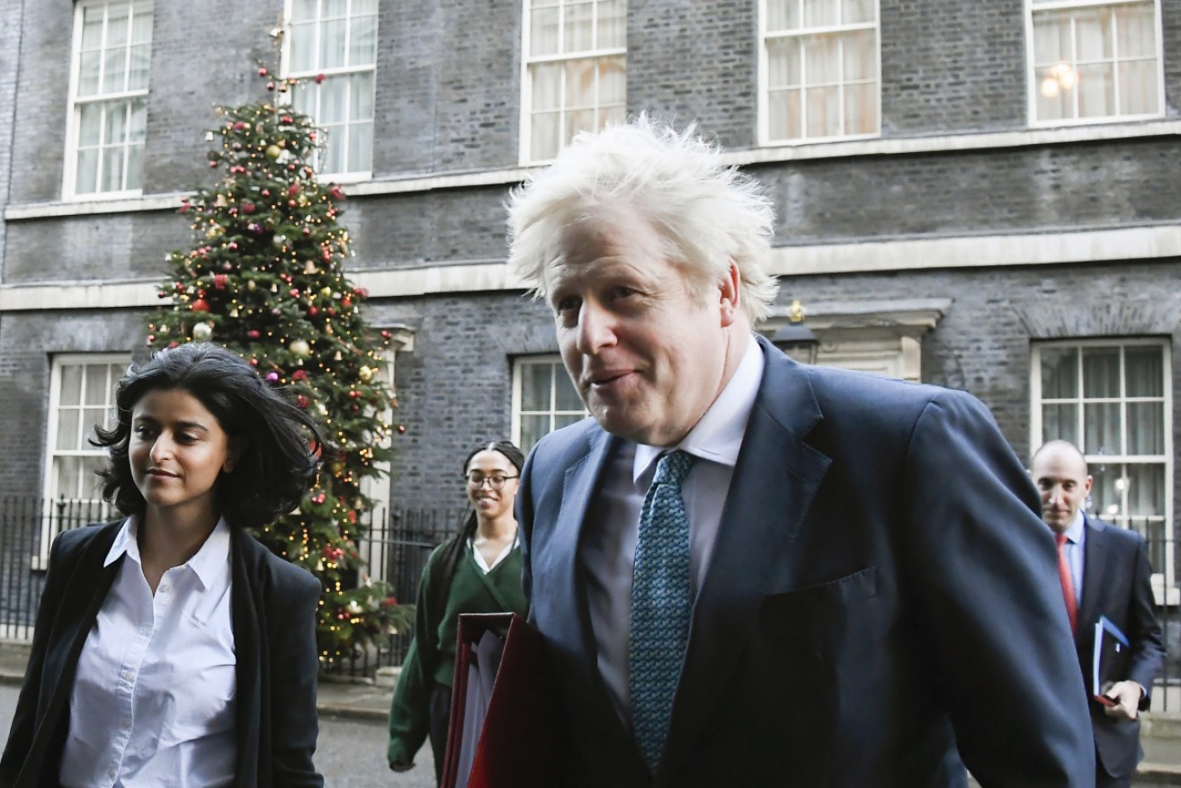 British Prime Minister Boris Johnson is under pressure over loosened coronavirus restrictions for the Christmas period.