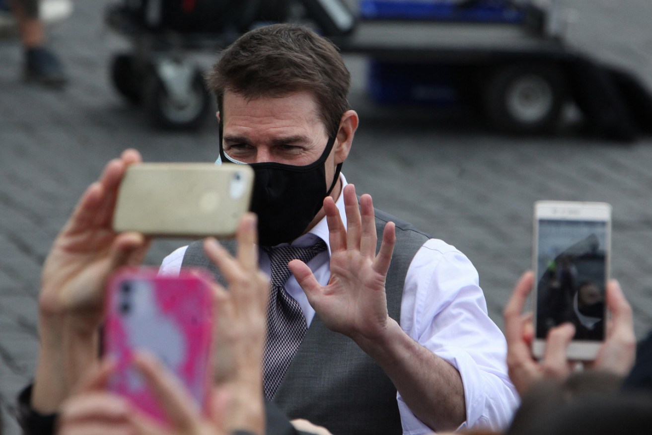Tom Cruise sports a mask while <i>Mission: Impossible 7</i> films in Rome in late November.