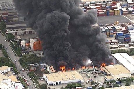 Warehouse fire in Brisbane&#8217;s Hemmant industrial precinct expected to burn for days