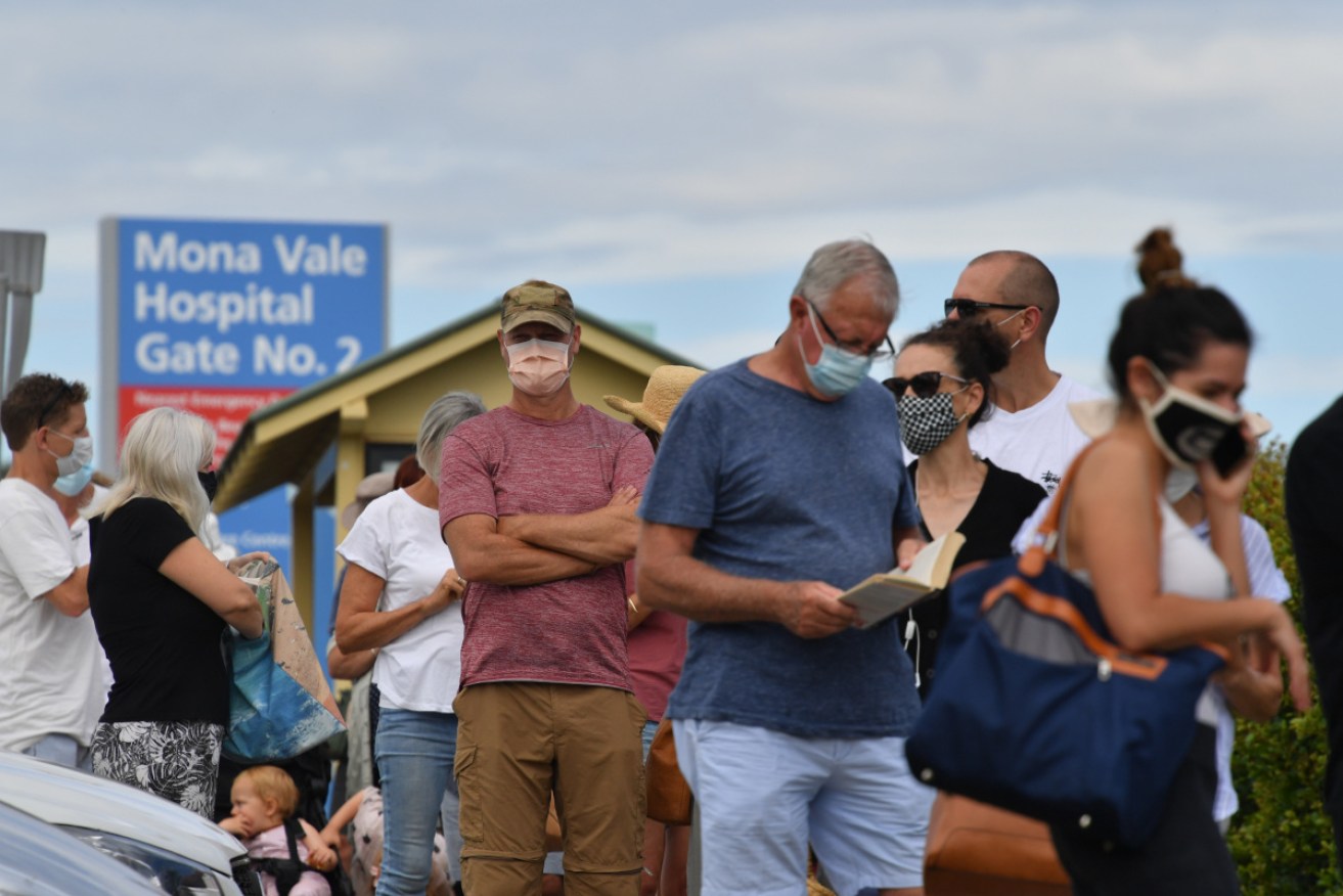 Residents line up at Mona Vale Hospital's walk-in clinic.