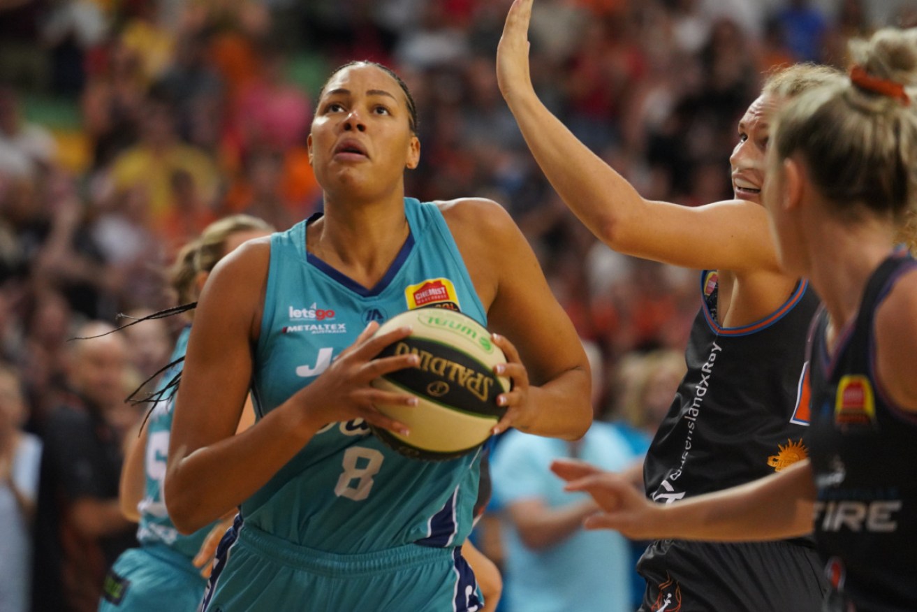 Southside Flyers' Liz Cambage breaks open the WNBL final at Townsville Stadium on Sunday.