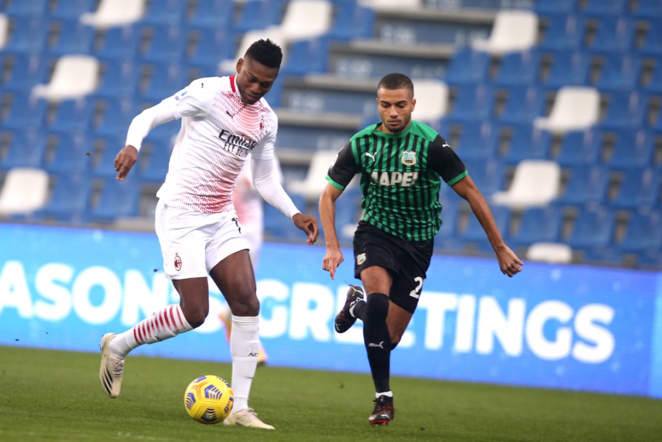 Rafael Leao (in white) on his rapid way to scoring the record-setting goal.