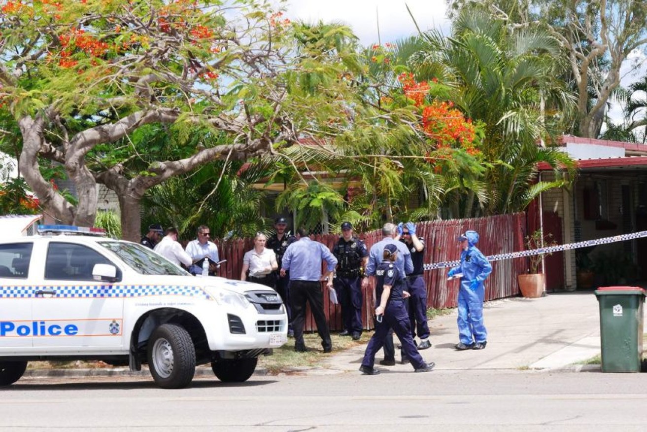 Police at the Townsville home on Tuesday morning.