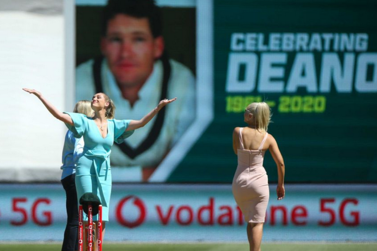Dean Jones's wife Jane and daughters Phoebe and Augusta were involved in a tribute during tea. Photo: AP/Brendon Ratnayake