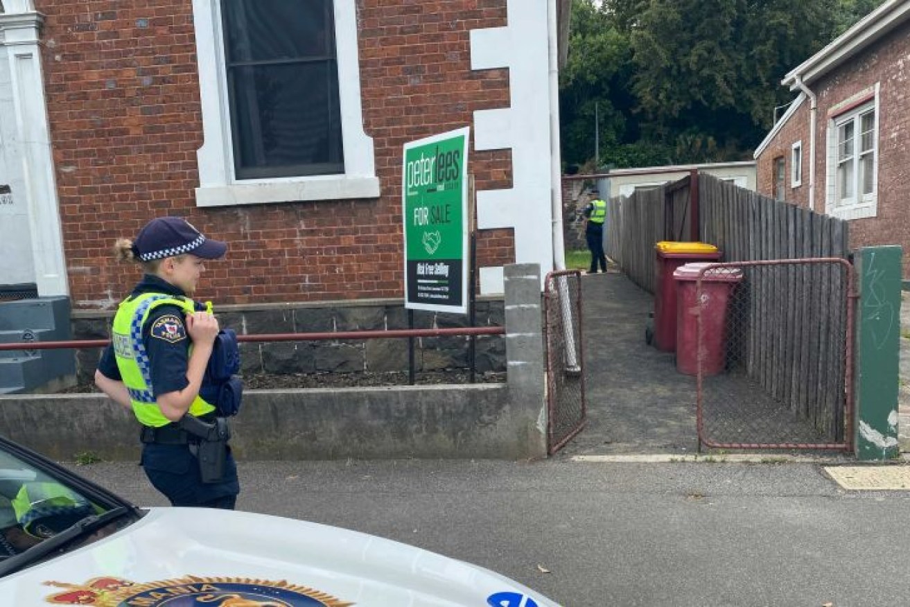 The Wellington Street house was examined by police.