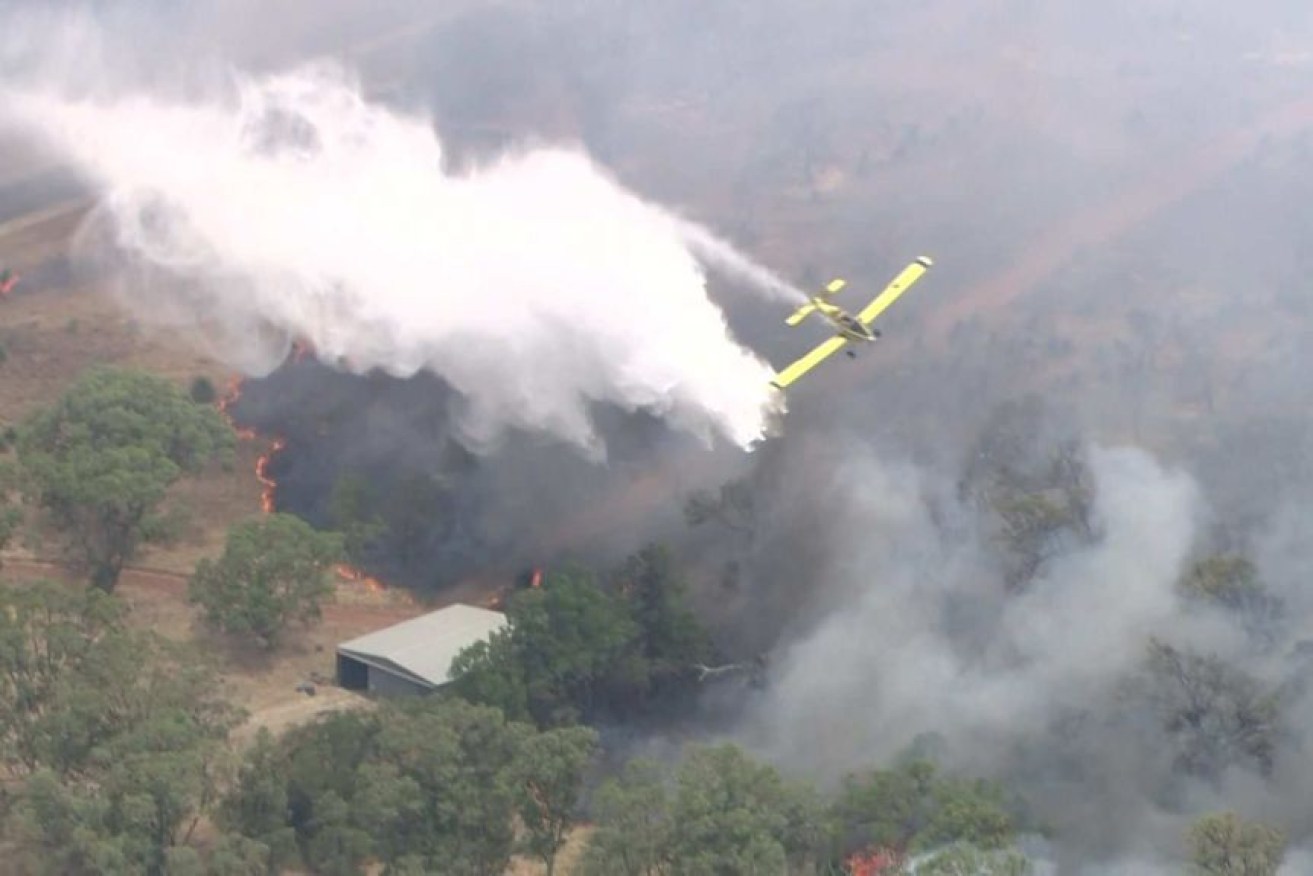 Aerial support has been brought in to tackle the fire at Kwinana Beach.