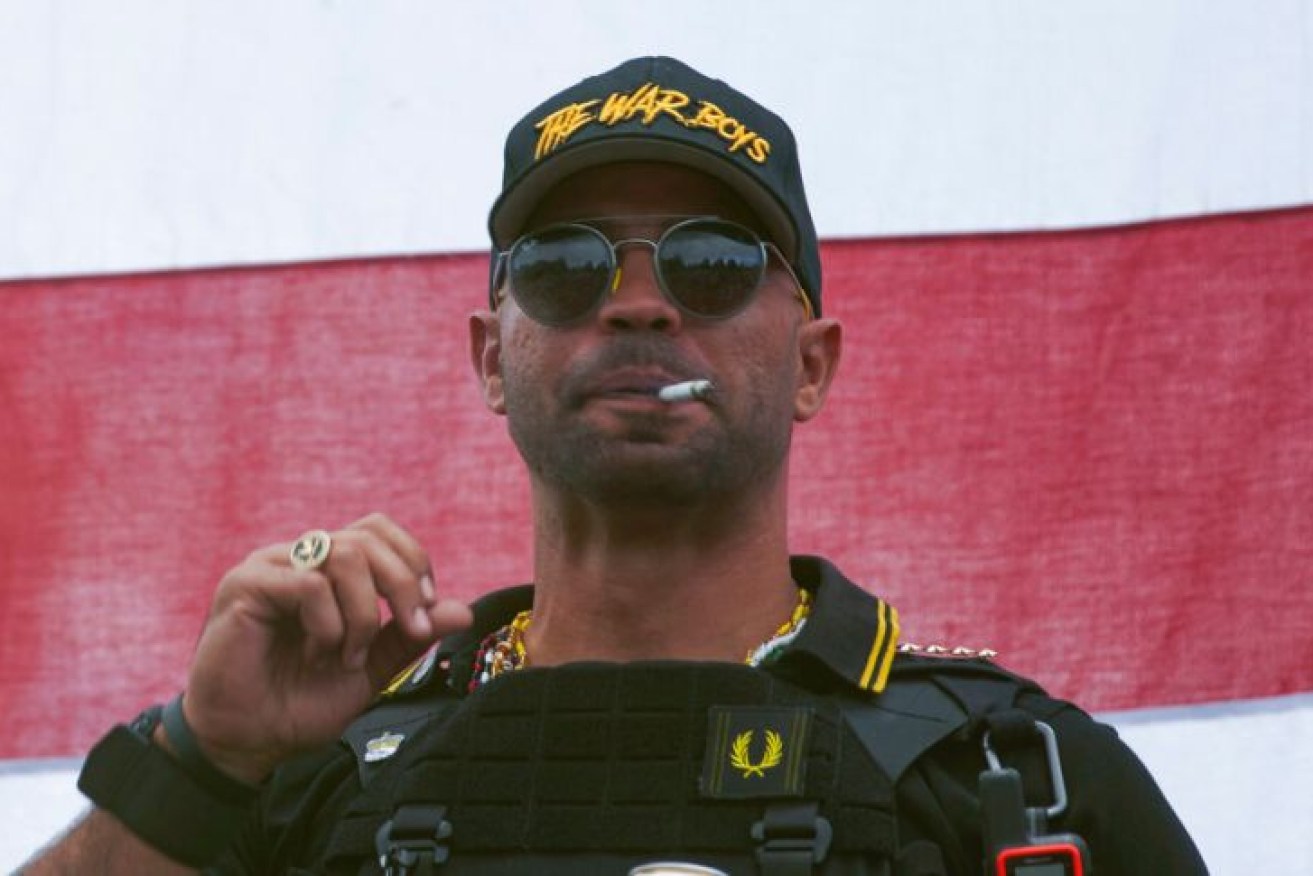 Enrique Tarrio was taken into custody and charged with destruction of property.