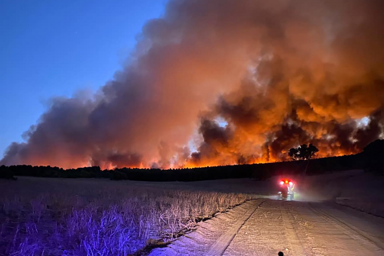 Emergency warnings have been issued for the Red Gully bushfire, near Gingin, north of Perth, on Tuesday.