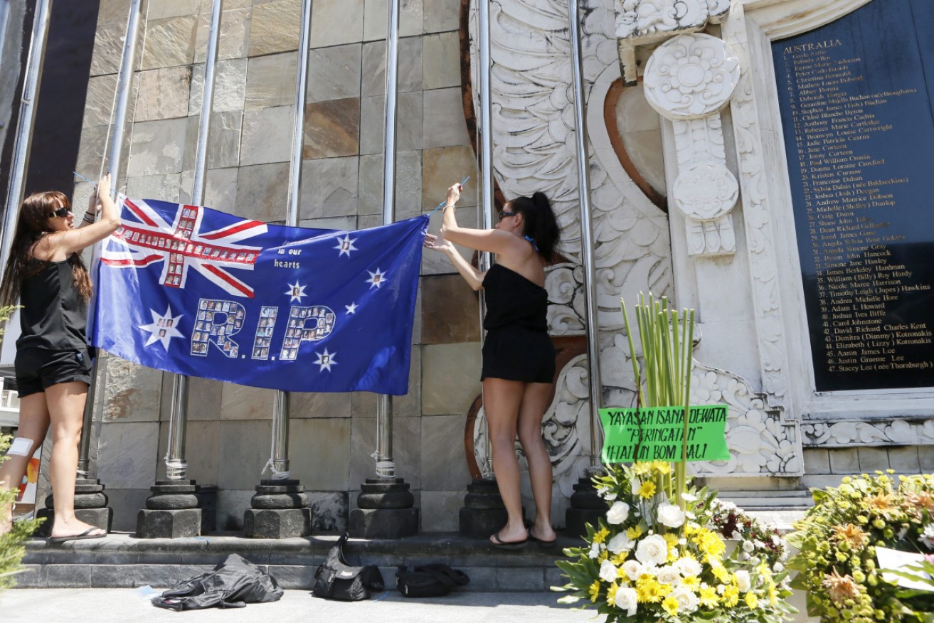 Relatives of the 2002 Bali bomb victims at the memorial monument on the 11th anniversary in Kuta in October 2013.
